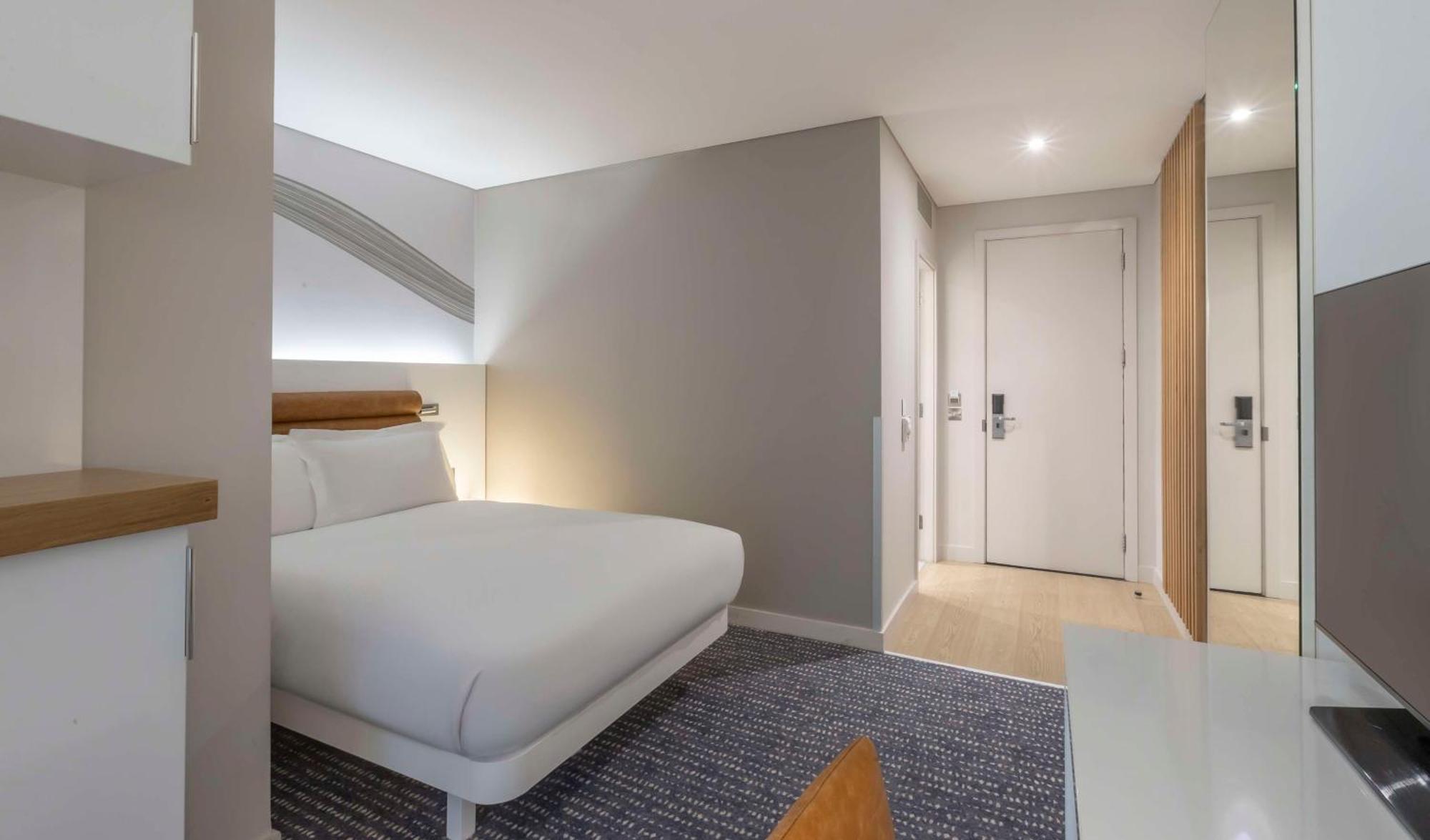 莫里森酒店-希尔顿逸林酒店 都柏林 外观 照片 A bedroom at the hotel